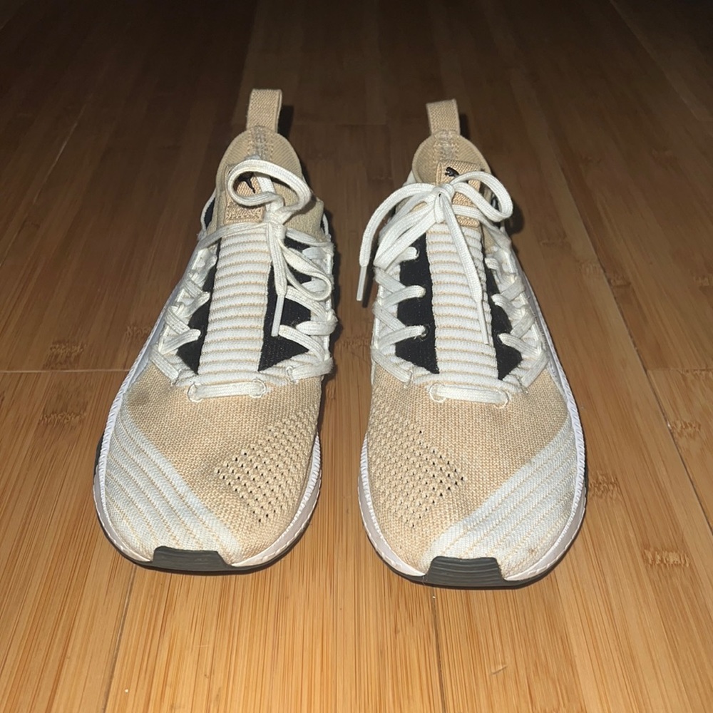PUMA women’s sneaker black white & tan color